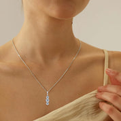 Light Luxury Fashion 925 Silver 5mm&4mm Round D Color VVS1 Moissanite Three-Stone Vertical Pendant Necklace for Women