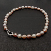 Natural Freshwater cultured pearl, white, pink, and purple rice pearl.