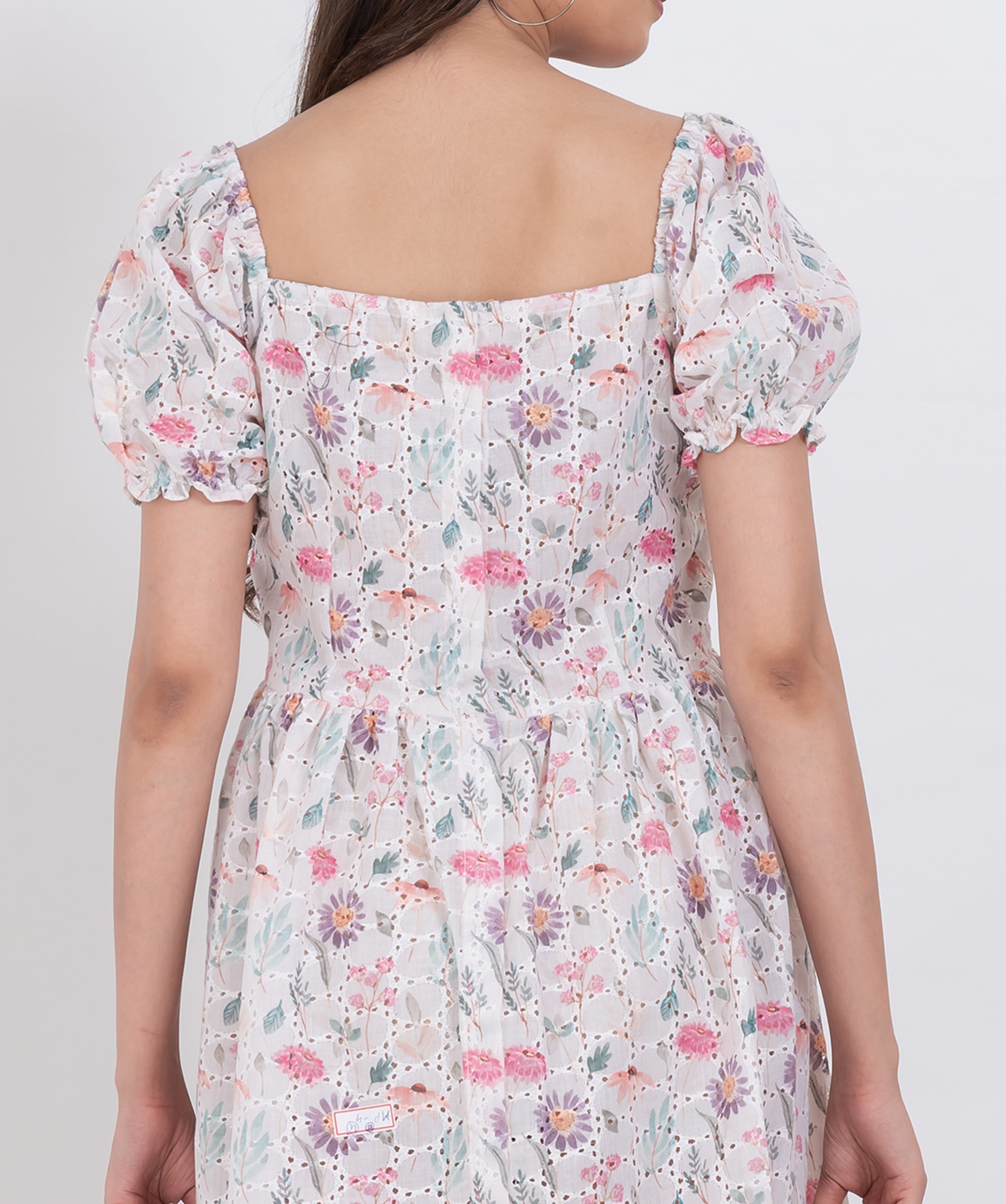 Casual floral dress with puff sleeves, tiered A-line silhouette for summer