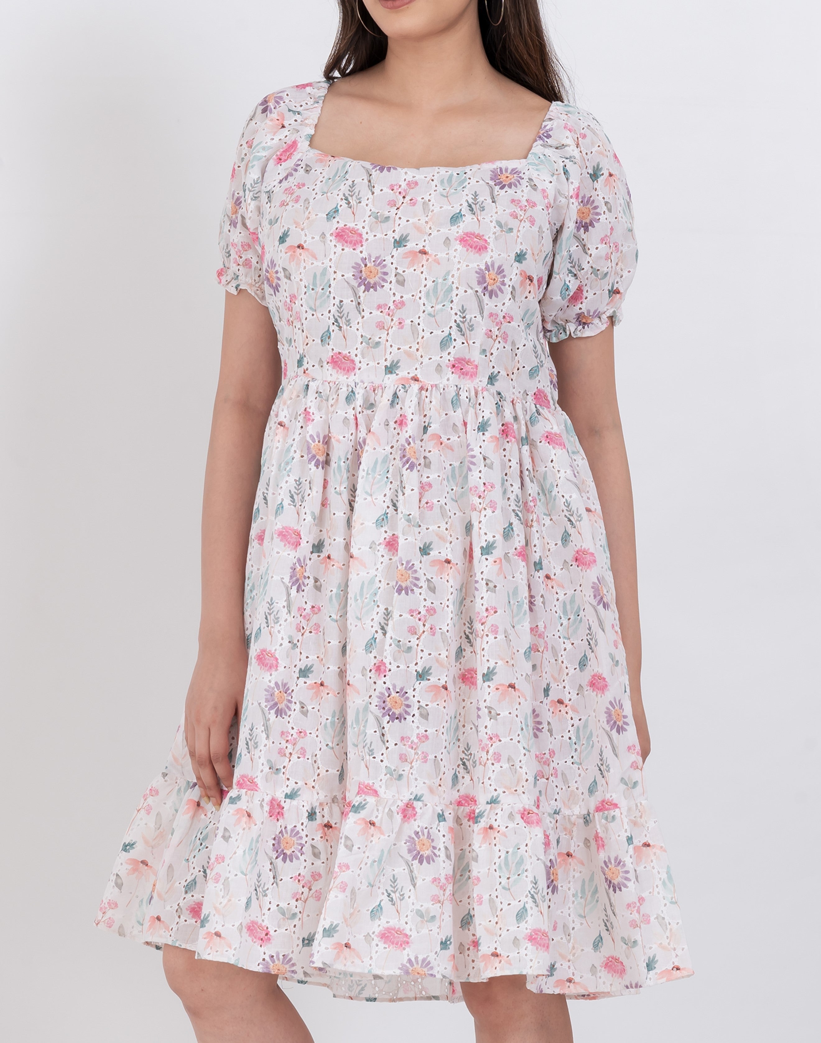 Elegant floral dress with puff sleeves, perfect for semi-formal gatherings