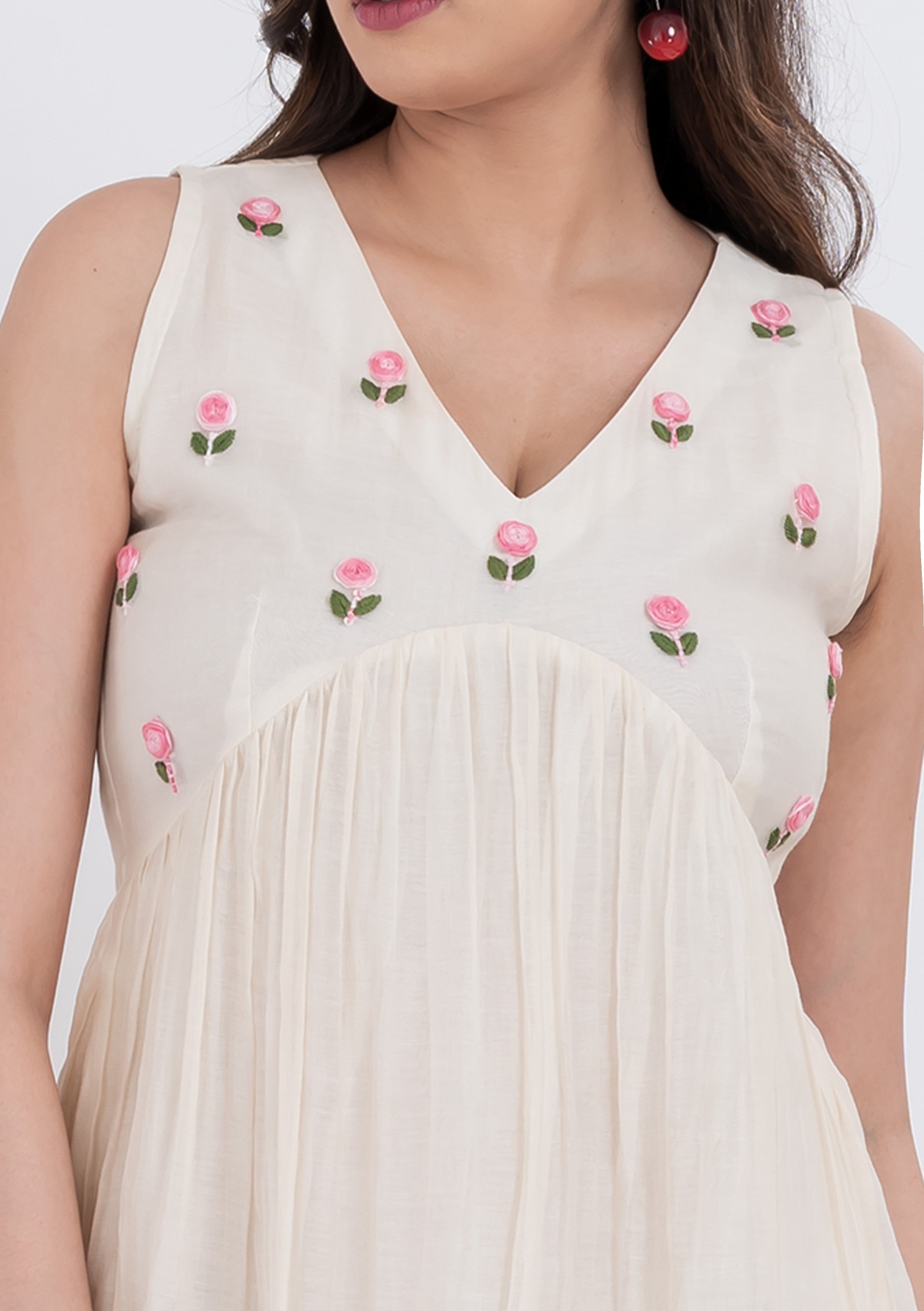 Elegant floral embroidered cotton silk dress with a delicate neckline.