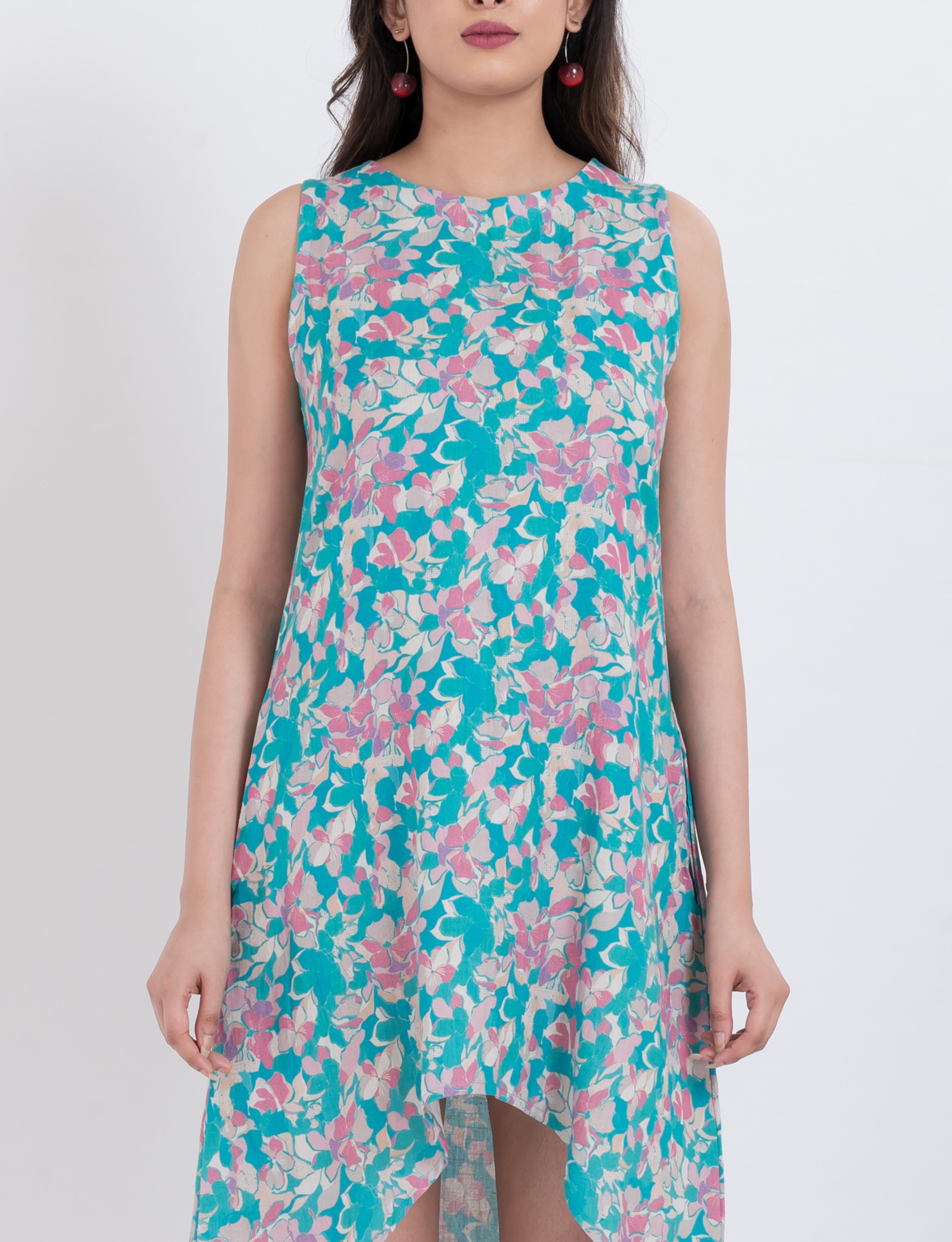 Floral overlap hem midi dress crafted from soft handloom cotton featuring a flattering sleeveless cut and airy design.