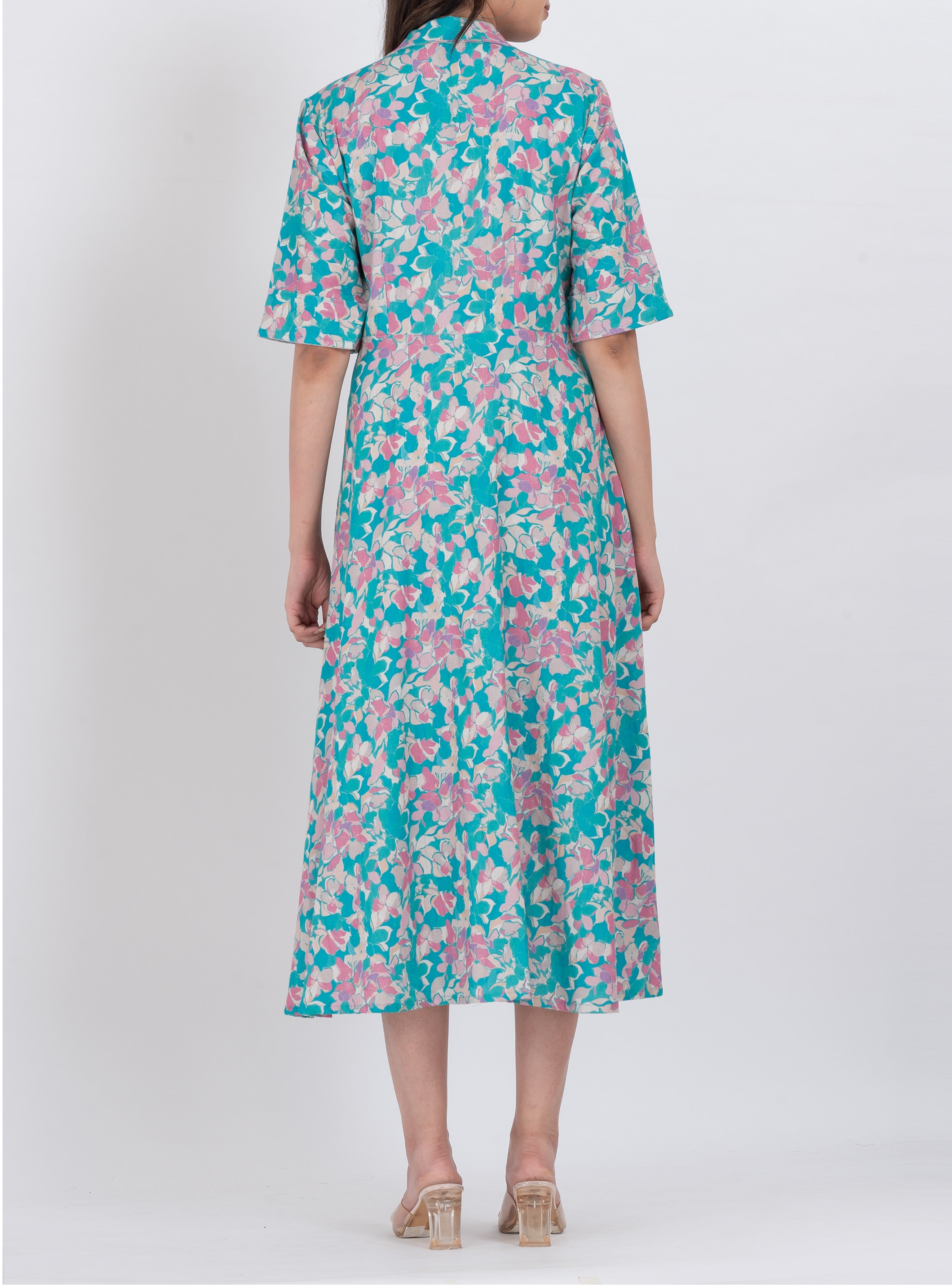 a flattering a-line floral maxi dress with short sleeves and a relaxed fit for summer wear.