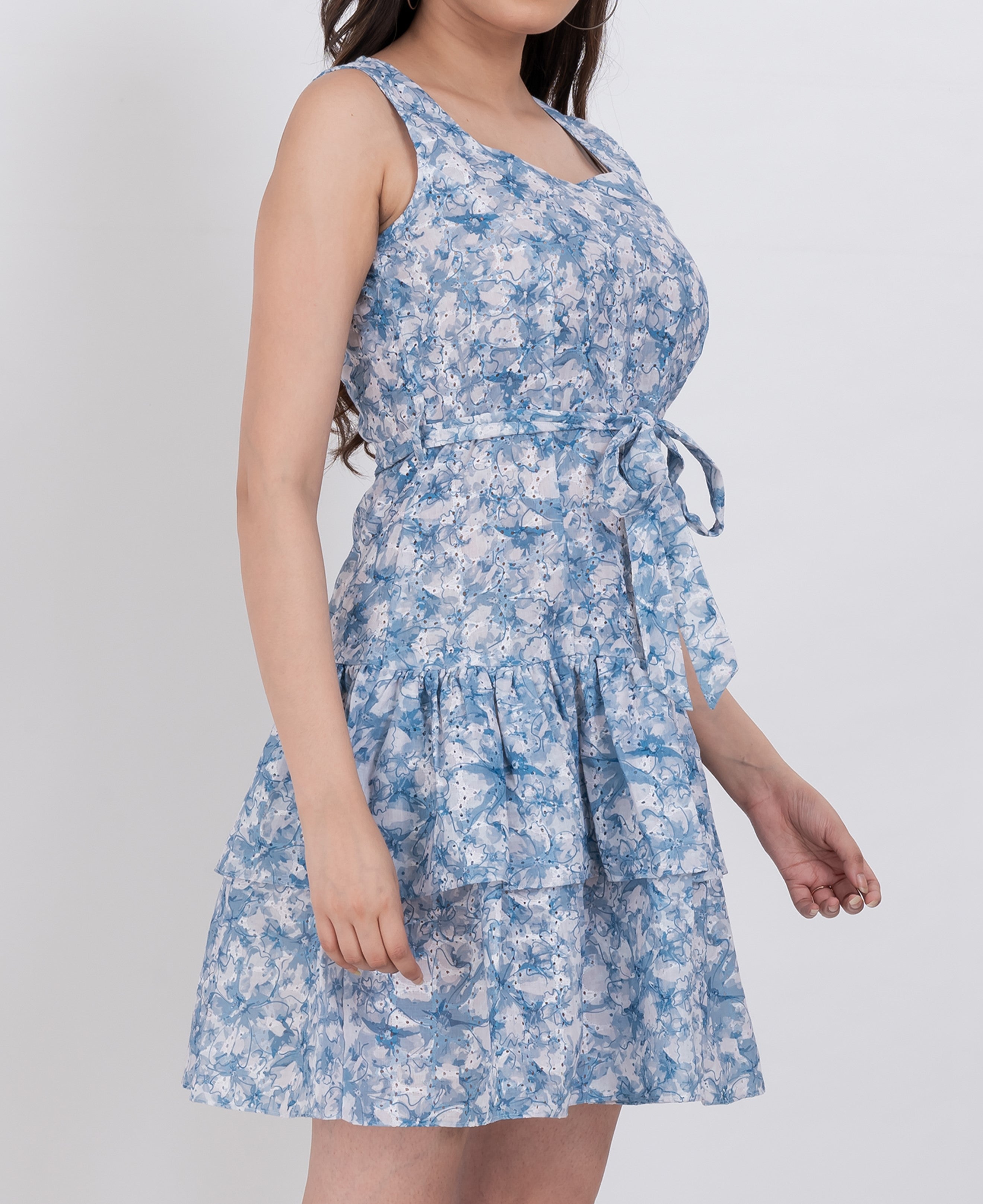  Close-up of the tiered detail of the floral print dress