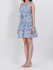 Sleeveless summer dress with floral print and belted waist