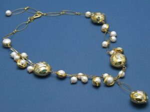 Natural Freshwater Cultured White Keshi Pearl Necklace.