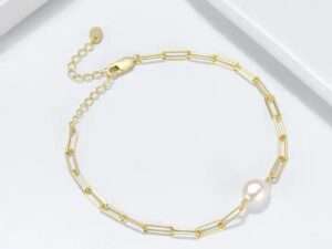 Silver baroque pearl link chain bracelet.